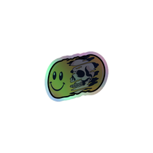 Load image into Gallery viewer, SMILEY SKULL HOLO STICKER
